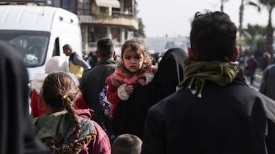 The army urged residents to 'distance themselves from SDF positions' in the neighbourhood. AFP