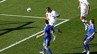 Winston Reid of New Zealand scores the first goal for his team at the Royal Bafokeng Stadium in Rustenburg.