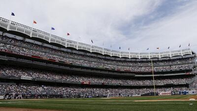 New York Yankees starting pitcher Hiroki Kuroda, of Japan, delivers a pitch to Boston Red Sox's Xander Bogaerts during the second inning of a baseball game in New York. Frank Franklin II / AP Photo