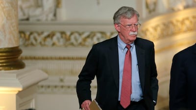 National Security Adviser John Bolton arrives for a press conference. Joe Skipper / Reuters