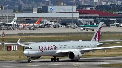 An Airbus A350 of Qatar Airlines lands at Toulouse-Blaignac airport. AFP / REMY GABALDA