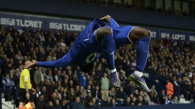 Everton's Romelu Lukaku does a flip to celebrate scoring Evertons third, winning goal on Monday night against West Bromwich Albion. Oli Scarff / AFP / September 28, 2015