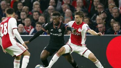 Chelsea's Callum Hudson-Odoi fights off the challenbge from Joel Veltman. EPA