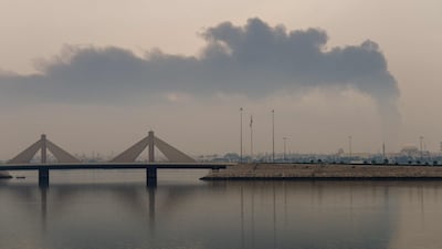 Smoke rises after a reported Iranian strike on fuel tanks in Muharraq, Bahrain, on Thursday. AFP