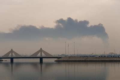 Smoke rises after a reported Iranian strike on fuel tanks in Muharraq, Bahrain, on Thursday. AFP