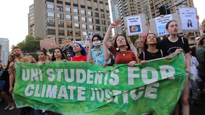 Protesters take part in a climate change rally under the slogan 'Sack ScoMo!' in Sydney, New South Wales, Australia. EPA