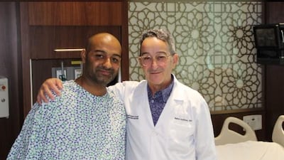 Mohamed Qasim's life was saved by a team led by Dr Redha Souilamas, right. Courtesy: Cleveland Clinic Abu Dhabi