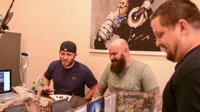 From left, Chap Swindall, Ashley Witt and Sugie Reaves play 'Curse of Strahd' during their Dungeons & Dragons session.