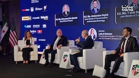Syrian Finance Minister Mohammed Yisr Barnieh, second left, on a panel at the First Syrian-American Business Forum in Damascus. Photo: Sana