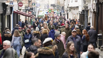 Last-minute shopping on Christmas Eve in Winchester, southern England