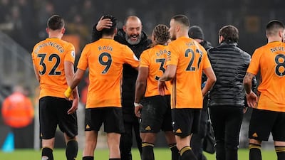 Wolves manager Nuno Espirito Santo celebrates with his players after the match. Reuters