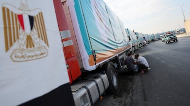 Lorries loaded with humanitarian aid near the Rafah crossing. Reuters