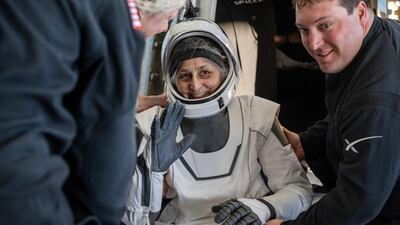 Nasa astronaut Suni Williams being helped out of a SpaceX Dragon spacecraft on board the SpaceX recovery ship Megan. AFP