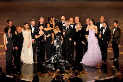 Director Paul Thomas Anderson and cast members celebrate as they accept the Oscar for Best Picture for One Battle after Another. Reuters