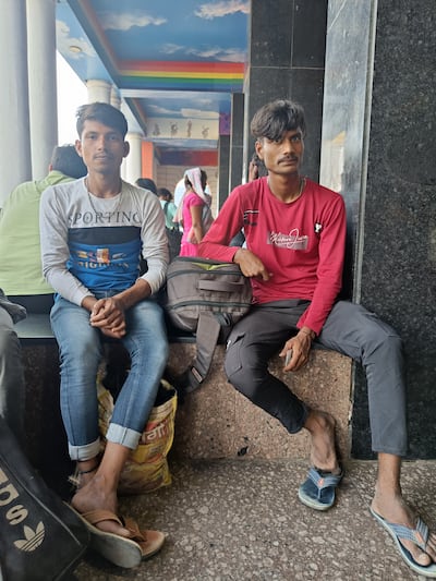 Suraj Kumar (left) says he is anxious about travelling by train. Taniya Dutta / The National