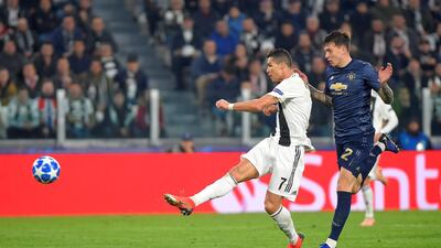 Juventus' Cristiano Ronaldo scores their first goal. Reuters