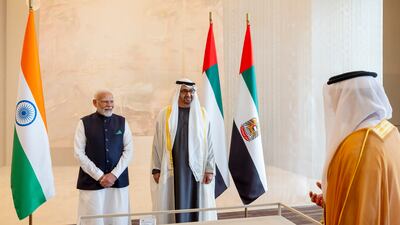 Sheikh Mohamed and Mr Modi attend the launch of the Rupay / Jaywan digital debit card during the reception. Ryan Carter / Presidential Court