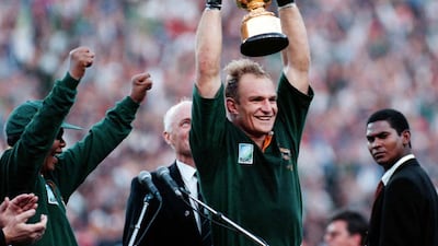 The last time South Africa hosted the Rugby World Cup was in 1995 when they won the tournament. In this picture, South Africa captain Francios Pienaar, centre, raises the trophy after receiving it from South Africa President Nelson Mandela. Jan Hamman / AP Photo