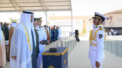 President Sheikh Mohamed is saluted by a graduate at Zayed Military University. Photo: Hamad Al Kaabi / UAE Presidential Court