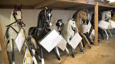 Rocking horses wait to be finished at Stevenson Brothers rocking horse makers in the village of Bethersden, near Ashford, United Kingdom. Stephen Lock for the National