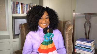 Television producer Shonda Rhimes and the Barbie doll made for her. Photo: Mattel