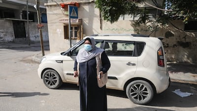 In the coastal Palestinian territory women have the same legal rights as men to drive a vehicle, but in practice the trade of taxi driver has been exclusively male, until now . Photo by Majd Mahmoud
