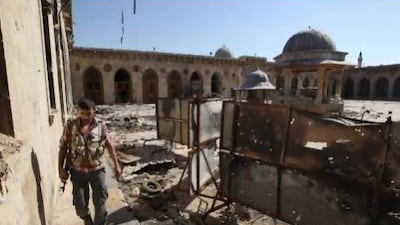 A Free Syrian Army fighter inside the Grand Umayyad mosque in Aleppo. Russian experts claim Syrian rebels made and used sarin gas in Aleppo in March, but they have denied it.