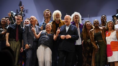 Midge Ure, Bob Geldof, Harvey Goldsmith, Brian May, Claire Bertschinger and performers on stage for the curtain call at the Live Aid 40th Anniversary Gala at the Shaftesbury Theatre in London. Getty Images