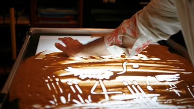 ~"You have to think about shape only, not colour. You only have white or sepia and shading takes too long so you have to take care of the shape.� Asmaa Al Hameli / The National