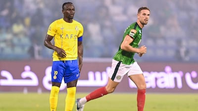 Jordan Henderson got the better of former Liverpool teammate Sadio Mane as Ettifaq fought back to beat Al Nassr. AFP