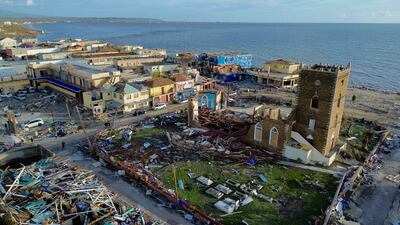 Damaged buildings around the St John's Anglican Church in Black River. AFP