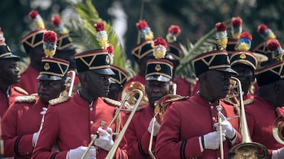 A military waits to perform as Pope Francis and his delegation departs the DRC. AFP
