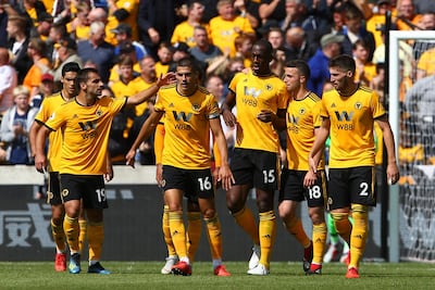 Wolverhampton Wanderers players celebrate with Wily Boly, third right, after his goal against Manchester City. AFP