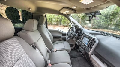 A fold-away central armrest flips up to create a third seat. Leslie Pableo for The National