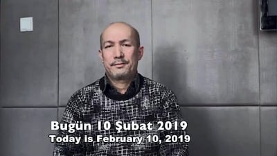 A screengrab from a Chinese state media video release purporting to show Uighur poet and musician Abdurehim Heyit in good health.