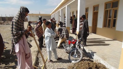 Community members build the school in Shin Kalay, a village in Afghanistan's Helmand province. Photo courtesy the Afghan Appeal Fund.