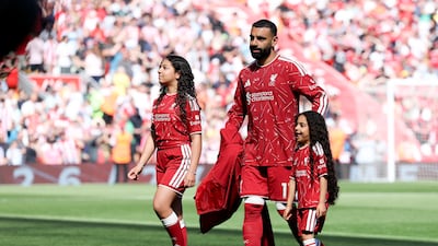 Mohamed Salah with his children ahead of Liverpool's match against Brentford. EPA