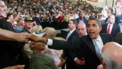 Barack Obama, the Democratic candidate, greets supporters during an event at Mountain Range High School in Westminster, Colorado.