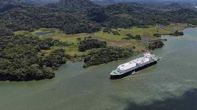 Bahamas‑flagged LNG tanker Nohshu Maru sails through the Panama Canal as it operates at top capacity. Reuters