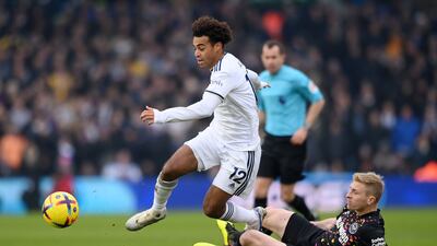 Tyler Adams of Leeds is tackled by Ben Mee of Brentford. Getty