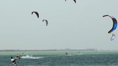 Kiteboarders enjoy themselves at Yas Island in Abu Dhabi. Ravindranath K / The National