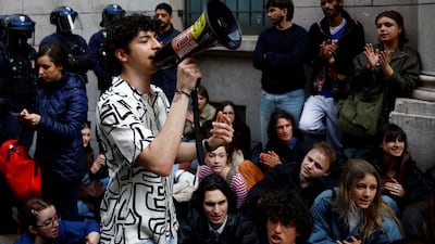 Students block the entrance to the Sorbonne University. Reuters