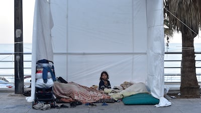 Displaced people in their tents at the seaside at Ramlet Al Baida beach in Beirut. More than one million people have been displaced by the Israeli air assault on the country. EPA