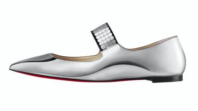 Wearing flats doesn't mean giving up on style. These shimmery Mary Janes from Christian Louboutin will work with shorts as well as with a gown. Oh, and they are easy to take off when boarding a yacht.