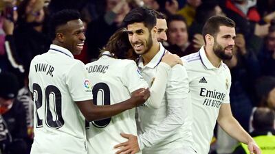 Real Madrid players celebrate their first goal scored by Marco Asensio. AFP