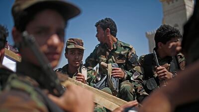 Houthi rebels ride on a vehicle during a funeral procession of Houthi fighters who were killed in recent fighting with forces of Yemen's Saudi-backed internationally recognized government, in Sanaa, Yemen on February 16, 2021. AP