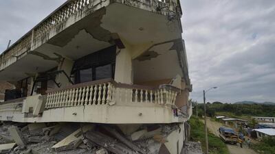 Tearful relatives looking for loved ones grabbed chunks of debris with their bare hands as they joined in the search alongside stretched firefighting teams. Rodridgo Buendia / AFP Photo