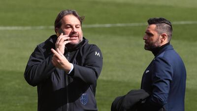 Parma's sport director Daniele Faggiano (L) and SPAL's sport director Davide Vagnati before the match. EPA