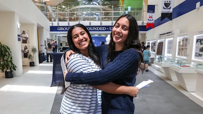 Hana Rose Simon and Alyaziah Alfalahi are happy with their results