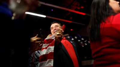 Supporter Ashur Warda cheers as midterm elections results come in at the GOP watch party in Arizona. Reuters